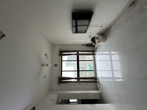 Living Room in 1 BHK Apartment at Runwal Gardens, Dombivli East – for Rent