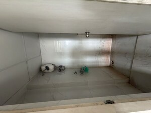Bathroom in 1 BHK Apartment at Runwal Gardens, Dombivli East – for Rent