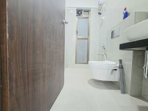 Bathroom in 2 BHK Apartment at Raymond Realty Phase II, Pokhran Road No Two – for Sale