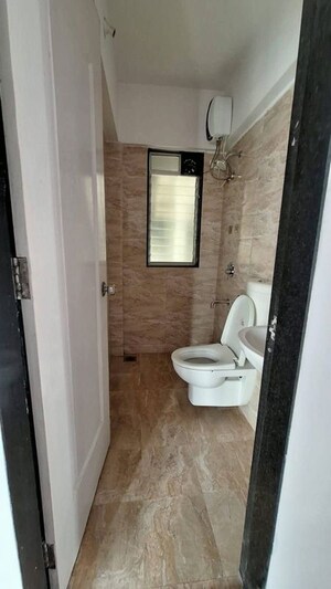 Bathroom in 2 BHK Apartment at Kopar Khairane – for Rent