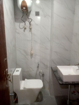 Bathroom in 2 BHK Builder Floor at Vasant Enclave – for Sale