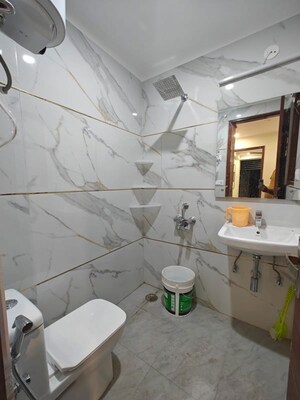 Bathroom in 1 RK Builder Floor at Ansal API Versalia, Sector 67a – for Rent