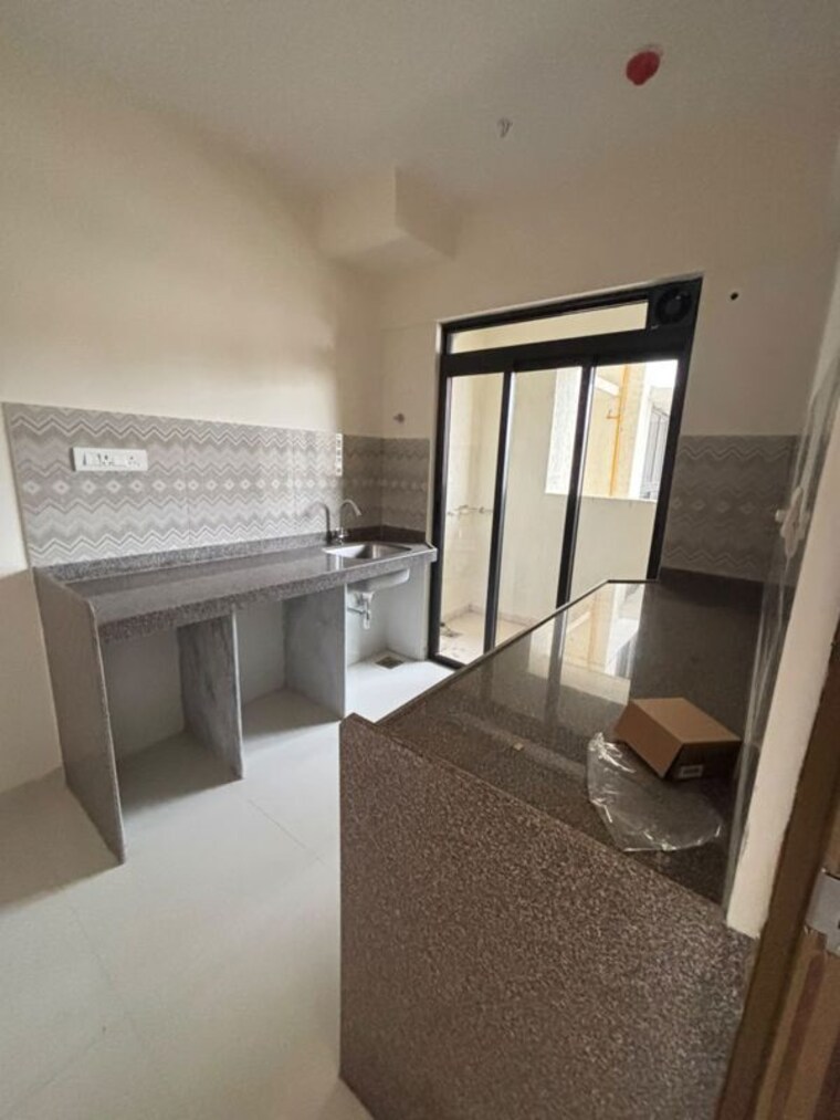 Kitchen, lodha-casa-supremo 2 Bedroom 668 Sq.Ft. Apartment In Mira Road East Thane 10585098