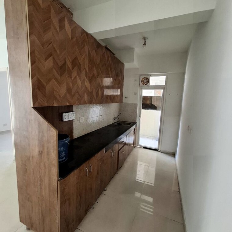 Kitchen, signature-global-the-millennia 2 Bedroom 800 Sq.Ft. Apartment In Sector 37d Gurgaon 10585121