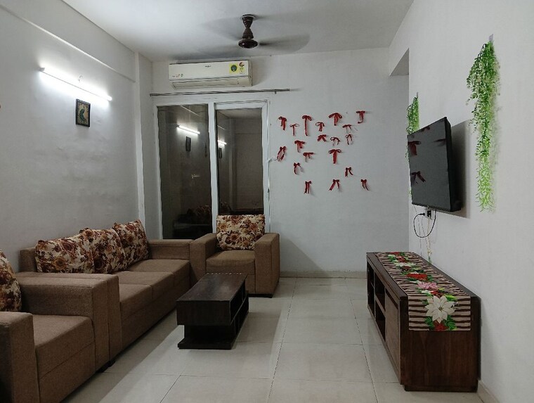 Living Room, signature-global-the-millennia 2 Bedroom 800 Sq.Ft. Apartment In Sector 37d Gurgaon 10585136