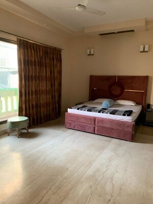 Bedroom in 4 BHK Builder Floor at Safdarjung Enclave – for Sale