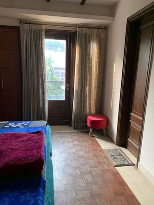Bedroom in 4 BHK Builder Floor at Safdarjung Enclave – for Sale