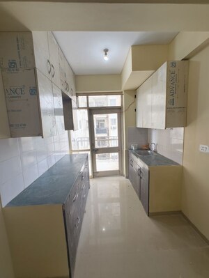 Kitchen in 2 BHK Apartment at Adani Aangan, Sector 89a – for Rent