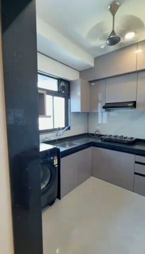 Kitchen in 2 BHK Apartment at Dev Leo Tower, Oshiwara – for Rent