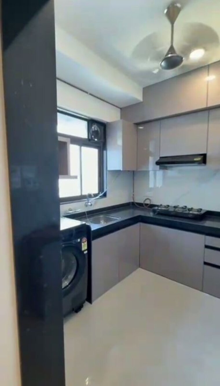 Kitchen, dev-leo-tower 2 Bedroom 650 Sq.Ft. Apartment In Oshiwara Mumbai 10585275