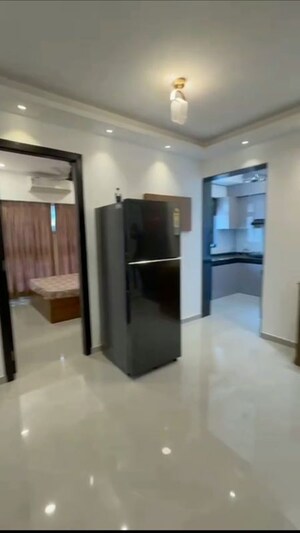 Living Room in 2 BHK Apartment at Dev Leo Tower, Oshiwara – for Rent
