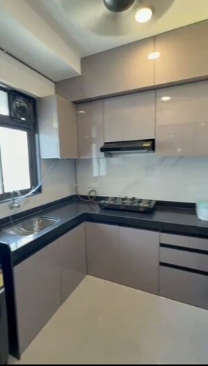 Kitchen in 2 BHK Apartment at Dev Leo Tower, Oshiwara – for Rent