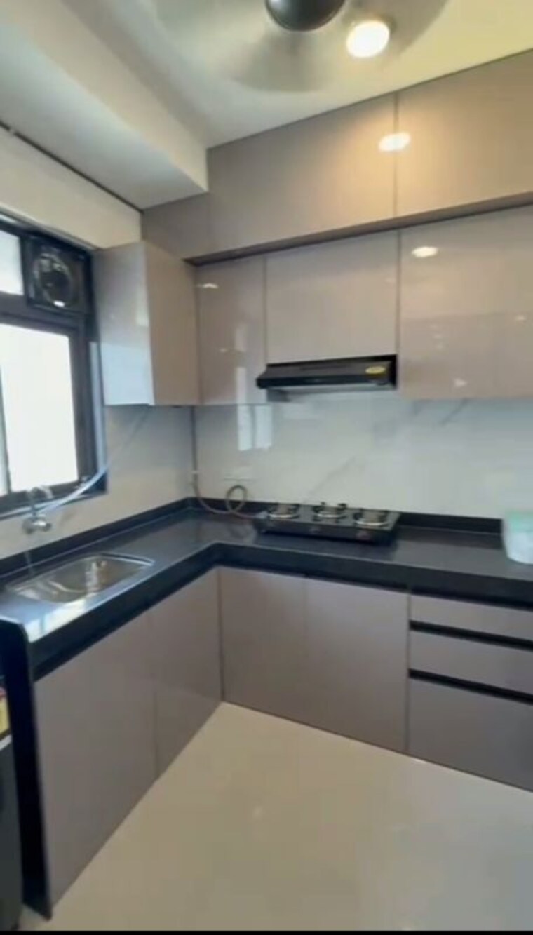 Kitchen, dev-leo-tower 2 Bedroom 650 Sq.Ft. Apartment In Oshiwara Mumbai 10585275