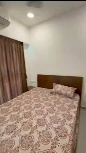 Bedroom in 2 BHK Apartment at Dev Leo Tower, Oshiwara – for Rent