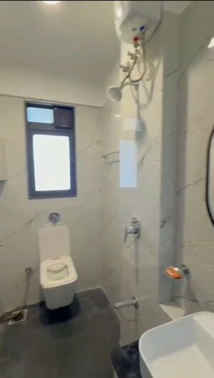 Bathroom in 2 BHK Apartment at Dev Leo Tower, Oshiwara – for Rent