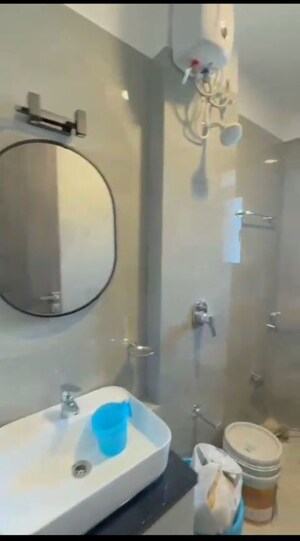 Bathroom in 2 BHK Apartment at Dev Leo Tower, Oshiwara – for Rent