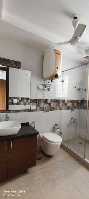 Bathroom in 4 BHK Builder Floor at Defence Colony – for Rent