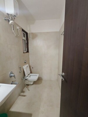 Bathroom in 2.5 BHK Apartment at Puranik City, Kasarvadavali – for Sale