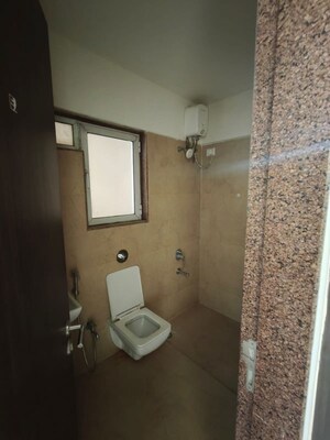 Bathroom in 2.5 BHK Apartment at Puranik City, Kasarvadavali – for Sale