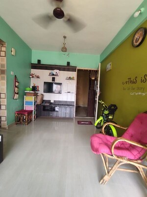 Living Room in 1 BHK Apartment at Kavya Hill View CHS, Anand Nagar – for Sale