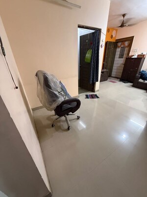 Living Room in 2 BHK Apartment at Buttercup CHS, Ambernath West – for Sale