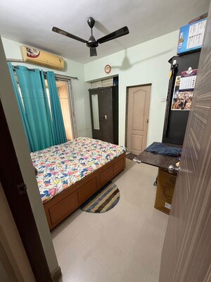 Bedroom in 2 BHK Apartment at Buttercup CHS, Ambernath West – for Sale