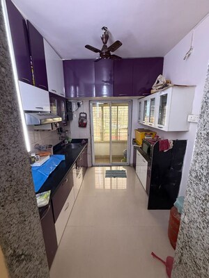 Kitchen in 2 BHK Apartment at Buttercup CHS, Ambernath West – for Sale