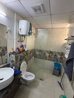 Bathroom in 3 BHK Apartment at Gaur Sportswood, Sector 79 – for Rent
