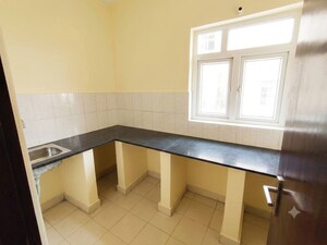 Kitchen in 2 BHK Apartment at Shrachi Greenwood Elements, Rajarhat New Town – for Rent