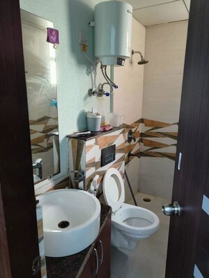 Bathroom in 3 BHK Apartment at Gaur Sportswood, Sector 79 – for Rent