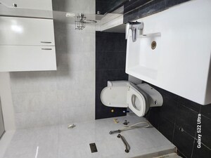 Bathroom in 3 BHK Apartment at Aparna Sarovar, Nallagandla – for Rent