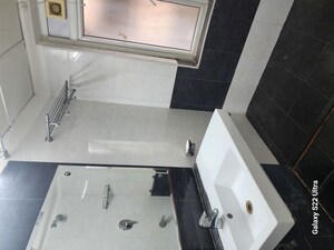 Bathroom in 3 BHK Apartment at Aparna Sarovar, Nallagandla – for Rent