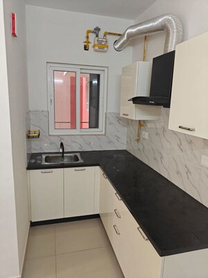 Kitchen in 2 BHK Apartment at Brigade El Dorado, Bagaluru – for Rent