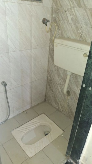 Bathroom in 1 BHK Apartment at Kuber Dhanalaxmi, Ulwe – for Rent