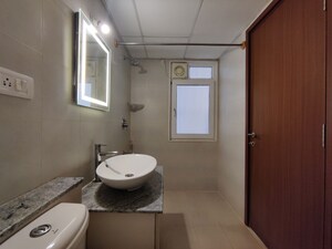 Bathroom in  Apartment at Bhartiya Nikoo Homes Phase 2, Thanisandra Main Road – for Rent