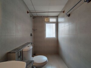 Bathroom in  Apartment at Bhartiya Nikoo Homes Phase 2, Thanisandra Main Road – for Rent