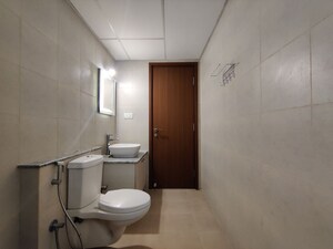 Bathroom in  Apartment at Bhartiya Nikoo Homes Phase 2, Thanisandra Main Road – for Rent