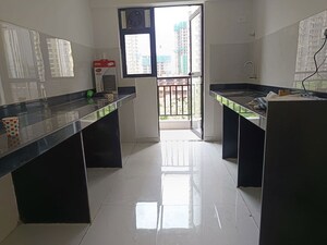 Kitchen in 1.5 BHK Apartment at Runwal Gardens, Dombivli East – for Sale