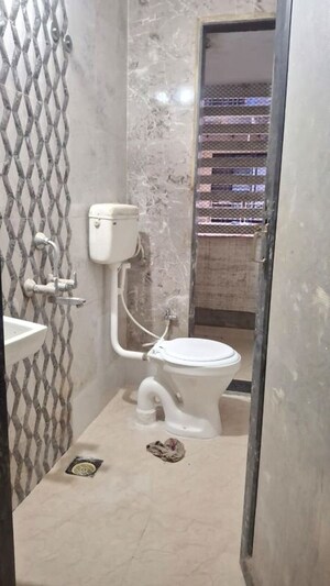 Bathroom in 2 BHK Apartment at Aarti Gaurav CHS, Ulwe – for Rent
