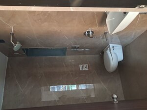 Bathroom in 2 BHK Apartment at MJ Shah Centrio, Govandi – for Rent