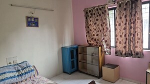 Living Room in 2 BHK Apartment at Anant Chambers Shivajinagar, Shivajinagar – for Rent