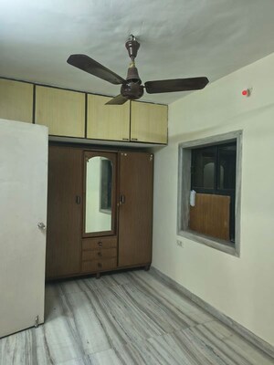 Room in 2 BHK Apartment at Tilak Bhavana CHS, Tilak Nagar – for Rent