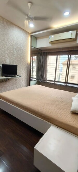 Bedroom in 4 BHK Apartment at K Rahega Palm Springs, Malad West – for Rent