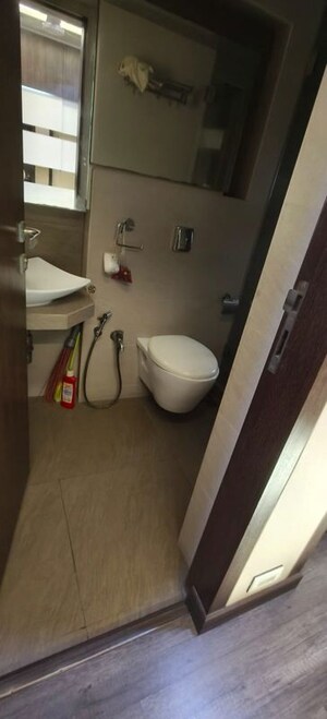 Bathroom in 4 BHK Apartment at K Rahega Palm Springs, Malad West – for Rent
