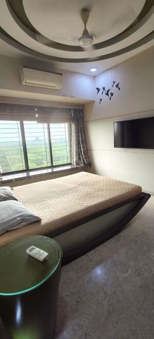 Bedroom in 4 BHK Apartment at K Rahega Palm Springs, Malad West – for Rent