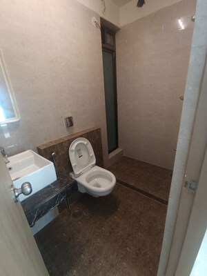 Bathroom in 2 BHK Apartment at Raj Infinia, Malad West – for Rent
