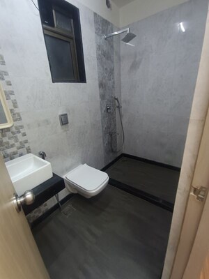 Bathroom in 2 BHK Apartment at Raj Infinia, Malad West – for Rent