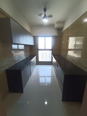 Kitchen in 2 BHK Apartment at Raj Infinia, Malad West – for Rent