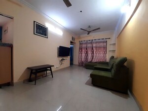 Living Room in 2 BHK Apartment at Satellite Garden, Goregaon East – for Rent