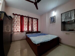 Bedroom in 2 BHK Apartment at Satellite Garden, Goregaon East – for Rent